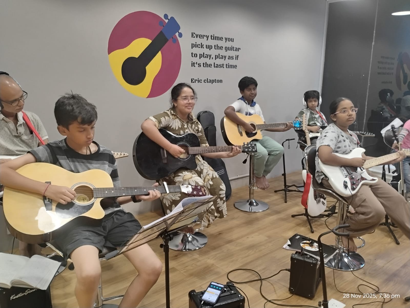 Group guitar class at Nizampet Music Academy