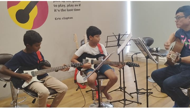 Group guitar class at Nizampet Music Academy, Hyderabad